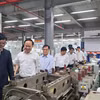 Trong khuôn khổ chương trình, đoàn đại biểu đã đến thăm Công ty Cổ phần Sản xuất và Xuất nhập khẩu Bao bì Thăng Long, doanh nghiệp tiêu biểu đã tham gia chương trình tư vấn cải tiến. (Ảnh: Vietnam+)