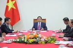 Thủ tướng Phạm Minh Chính điện đàm với Thủ tướng Campuchia Hun Manet. (Ảnh: Dương Giang/TTXVN)