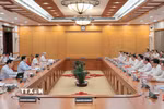 Ủy viên Bộ Chính trị, Chủ tịch nước Lương Cường chủ trì buổi làm việc. (Ảnh: An Đăng/TTXVN)