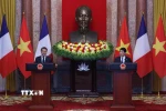 Chủ tịch nước Lương Cường và Tổng thống Pháp Emmanuel Macron tại buổi gặp gỡ báo chí. (Ảnh: Lâm Khánh/TTXVN)