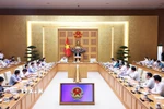 Thủ tướng Phạm Minh Chính chủ trì họp đánh giá sơ kết 1 tháng vận hành chính quyền địa phương hai cấp. (Ảnh: Dương Giang/TTXVN)