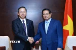 Thủ tướng Phạm Minh Chính tiếp ông Bành Cương Bình, Chủ tịch Hội đồng quản trị Công ty TNHH Tập đoàn Khoa học kỹ thuật Hoa Điện Trung Quốc. (Ảnh: Dương Giang/TTXVN)