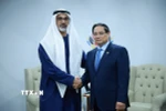 Thủ tướng Phạm Minh Chính gặp Hoàng Thái tử Abu Dhabi thuộc Các Tiểu vương quốc Arab Thống nhất (UAE) Khaled bin Mohamed bin Zayed Al Nahyan. (Ảnh: Dương Giang/TTXVN)