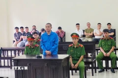 Đối tượng Hoàng Duy Quang tại phiên tòa. (Ảnh: TTXVN phát)