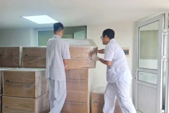 Công ty CP AVAC Việt Nam vận chuyển vaccine Dịch tả lợn châu Phi lên xe phục vụ xuất khẩu sang Indonesia. (Nguồn: AVAC)
