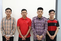Các đối tượng Triều, Sang, Tấn và Tiền (từ trái qua) tại Cơ quan Công an. (Ảnh: TTXVN phát)
