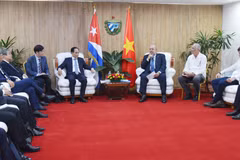 Quang cảnh cuộc hội kiến của Đặc phái viên của Tổng Bí thư, Chủ tịch nước Tô Lâm, đồng chí Lê Hoài Trung, Ủy viên Bộ Chính trị, Bộ trưởng Bộ Ngoại giao với Thủ tướng Cuba Manuel Marrero Cruz. (Ảnh: Việt Hùng/TTXVN)