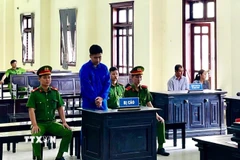 Bị cáo Nguyễn Gia Huy tại phiên tòa. (Ảnh: TTXVN phát)