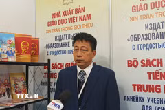 Tổng biên tập NXB Giáo dục Việt Nam Phạm Vĩnh Thái trả lời phỏng vấn TTXVN. (Ảnh: Tâm Hằng/TTXVN)