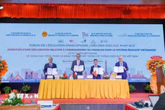 Lễ ký Tuyên bố chung về giảng dạy tiếng Pháp và bằng tiếng Pháp trong hệ thống giáo dục tại Việt Nam. (Ảnh: Sỹ Thắng/TTXVN)