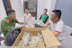 Cơ quan Công an lấy lời khai các đối tượng. (Nguồn: Nhân dân)