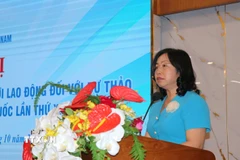 Bà Thái Thu Xương, Phó Chủ tịch thường trực Tổng Liên đoàn Lao động Việt Nam phát biểu khai mạc hội nghị. (Ảnh: Thanh Vũ/TTXVN)
