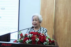 Bà Lương Thị Thuận - Chủ tịch Hội Bảo trợ trẻ em TPHCM - phát biểu khai mạc hội nghị. (Nguồn: Báo Phụ nữ)