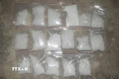 Công an thu giữ số lượng lớn ma túy. (Ảnh: TTXVN)