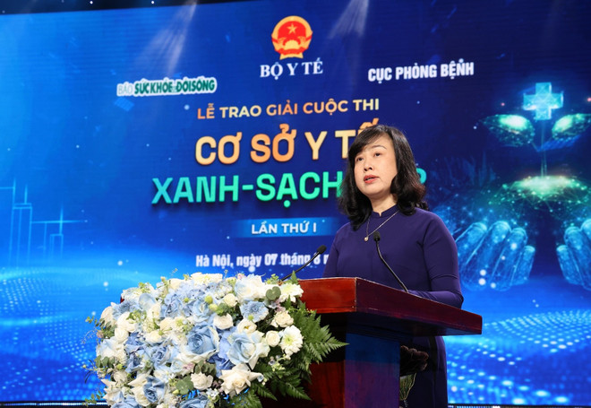 Bộ trưởng Bộ Y tế Đào Hồng Lan phát biểu. (Ảnh: PV/Vietnam+) ba-tra-ng-a-a-o-ha-ng-lan-phat-bia-u-khai-mac-va-cha-a-ao-chng-tranh-1.jpg
