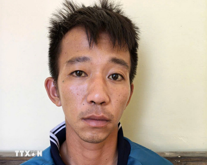 Đối tượng Cái Tô Gia Luật tại cơ quan Công an. (Ảnh: TTXVN phát)