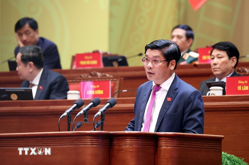 Đồng chí Nguyễn Chí Tài, Phó Bí thư Thành ủy, Chủ tịch Ủy ban Mặt trận Tổ quốc Việt Nam thành phố Huế, trình bày tham luận “Phát huy thế mạnh di sản, xây dựng Huế thành đô thị di sản, trung tâm văn hóa, du lịch đặc sắc tầm cỡ quốc tế.” (Ảnh: TTXVN)