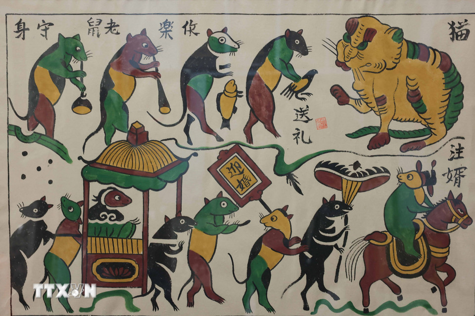 Bức tranh dân gian Đông Hồ in mộc bản "Đám cưới chuột." (Ảnh: Hoàng Hiếu/TTXVN)
