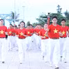 Nghi thức rước đuốc khởi động hành trình “Tôi yêu Tổ quốc tôi” năm 2026. (Ảnh: PV/Vietnam+)