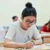 Thí sinh dự thi Tốt nghiệp trung học phổ thông. (Ảnh: Minh Sơn/Vietnam+)