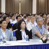 Các chuyên gia trong nước và quốc tế tham gia hội thảo. (Ảnh: PV/Vietnam+)