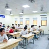 Thí sinh dự thi Tốt nghiệp trung học phổ thông. (Ảnh: Minh Sơn/Vietnam+)