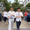 Thí sinh rời điểm thi sau môn cuối cùng. (Ảnh: Phạm Mai/Vietnam+)