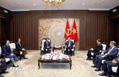 Tổng Bí thư, Chủ tịch nước Tô Lâm tiếp Ủy viên Bộ Chính trị, Phó Thủ tướng, Bộ trưởng Bộ Tư pháp Lào Khamphan Phommathat. (Ảnh: Thống Nhất/TTXVN)