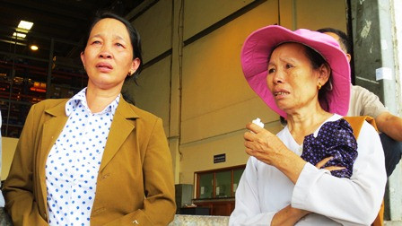 Người thân ngóng chờ các nạn nhân vụ cháy ở Nga ảnh 5