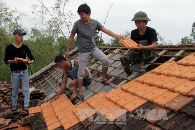 18 người chết, hàng trăm nghìn nhà bị ngập vì bão lũ ảnh 2 18 người chết, hàng trăm nghìn nhà bị ngập vì bão lũ ảnh 2