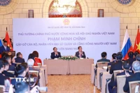 Thủ tướng Phạm Minh Chính gặp gỡ cán bộ, nhân viên Đại sứ quán và cộng đồng người Việt Nam tại Liên bang Nga. (Ảnh: Dương Giang/TTXVN)