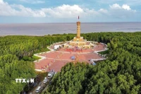 Đất Mũi Cà Mau - nơi chứa đựng cảm xúc thiêng liêng mà bất cứ du khách nào cũng cảm nhận được khi đặt chân đến đây. (Ảnh: Chanh Đa/TTXVN)