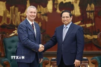 Thủ tướng Phạm Minh Chính tiếp Đại sứ Vương quốc Bỉ tại Việt Nam Karl Van den Bossche. (Ảnh: Dương Giang/TTXVN)