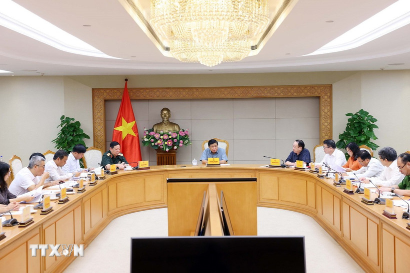 Quang cảnh cuộc họp về các dự án hợp tác Việt Nam-Lào. (Ảnh: Phạm Kiên/TTXVN)