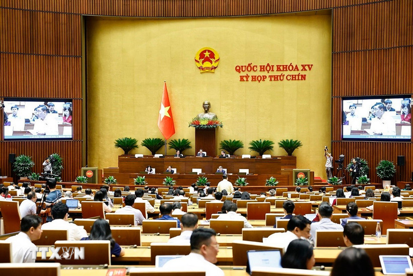 Quang cảnh phiên họp Quốc hội thảo luận về cơ chế xử lý khó khăn, vướng mắc do quy định của pháp luật. (Ảnh: Doãn Tấn/TTXVN)