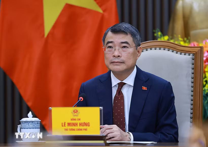 Thủ tướng Chính phủ Lê Minh Hưng điện đàm với Thủ tướng Trung Quốc Lý Cường. (Ảnh: Dương Giang/TTXVN)