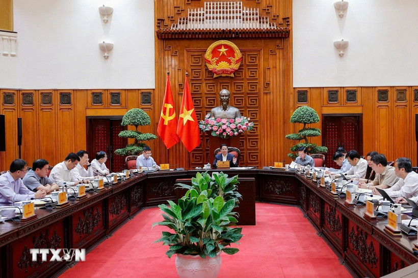 Thủ tướng Phạm Minh Chính chủ trì cuộc họp với các bộ, ngành để chuẩn bị đàm phán thương mại với phía Hoa Kỳ. (Ảnh: Dương Giang/TTXVN)