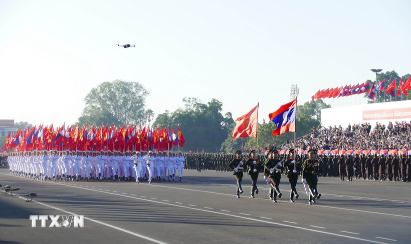Lễ kỷ niệm 50 năm Quốc khánh Lào. (Ảnh: Xuân Tú/TTXVN)