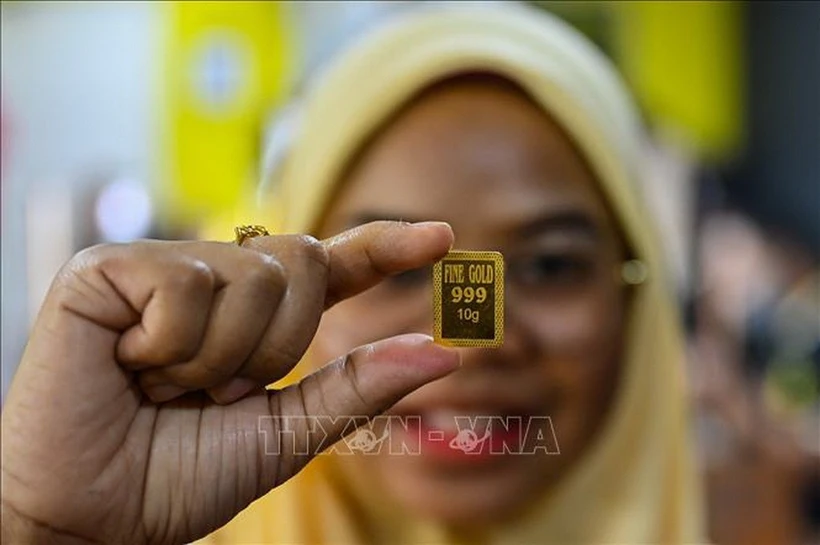 Vàng miếng được bán tại Kota Bharu, bang Kelantan, Malaysia. (Ảnh: AFP/TTXVN)