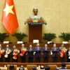 Các đồng chí lãnh đạo Đảng, Nhà nước chúc mừng các đồng chí Phó Chủ tịch Quốc hội, Uỷ viên Uỷ ban Thường vụ Quốc hội; các Phó Thủ tướng Chính phủ, Bộ trưởng nhận nhiệm vụ mới. (Ảnh: Phương Hoa/TTXVN)