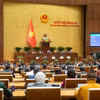Quốc hội đã biểu quyết thông qua Nghị quyết của Quốc hội thí điểm một số cơ chế, chính sách đặc thù, đặc biệt để phát triển hệ thống mạng lưới đường sắt đô thị tại thành phố Hà Nội, Thành phố Hồ Chí Minh. (Ảnh: QH/Vietnam+)