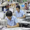 Hiện, tỷ lệ tham gia bảo hiểm xã hội đạt khoảng 45,1% lực lượng lao động trong độ tuổi và tỷ lệ bao phủ bảo hiểm y tế đạt trên 95% dân số. (Ảnh: Vietnam+)