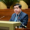 Bộ trưởng Bộ Kế hoạch và Đầu tư Nguyễn Chí Dũng thừa ủy quyền của Thủ tướng Chính phủ trình bày Tờ trình về Đề án bổ sung về phát triển kinh tế-xã hội năm 2025 với mục tiêu tăng trưởng đạt 8% trở lên. (Ảnh: QH/Vietnam+)