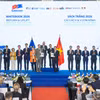 Nghi thức trao Sách Trắng từ EuroCham Việt Nam tới Chính phủ Việt Nam. (Ảnh: Vietnam+)