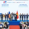 Nghi thức trao Sách Trắng từ EuroCham Việt Nam tới Chính phủ Việt Nam. (Ảnh: Vietnam+)