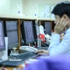Chỉ số VN-Index chính thức đánh mất ngưỡng hỗ trợ tâm lý quan trọng 1.600 điểm. (Ảnh: Vietnam+)
