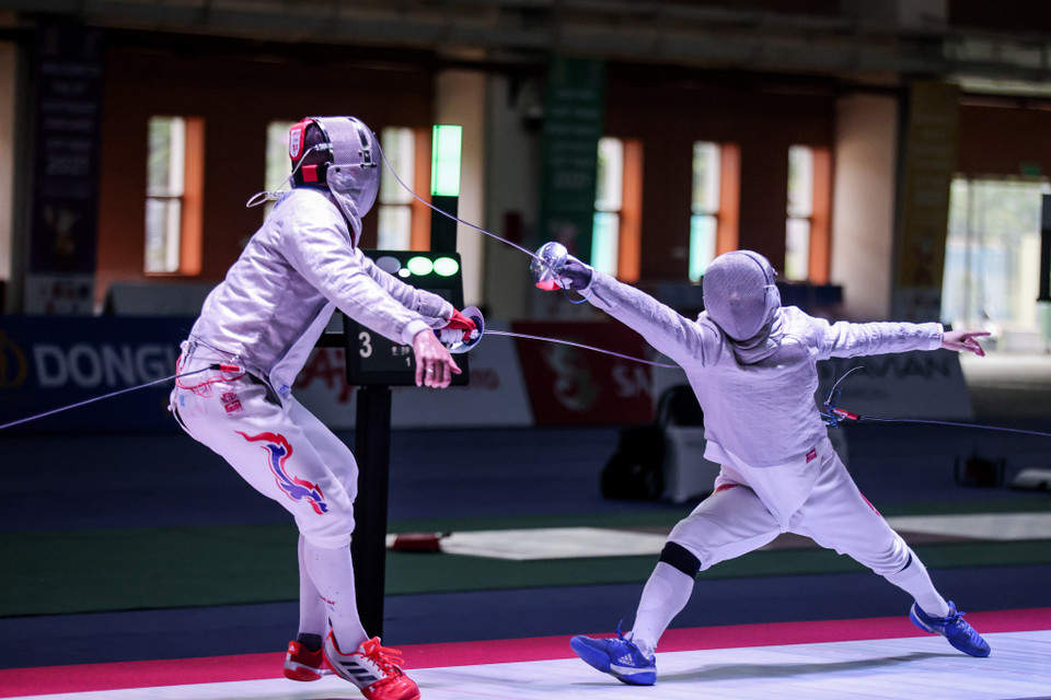 Xuất sắc đánh bại kiếm thủ đến từ Thái Lan, Vũ Thành An của đội tuyển kiếm Việt Nam tiếp tục bảo vệ thành công tấn huy chương vàng quý giá. (Ảnh: Minh Sơn/Vietnam+)