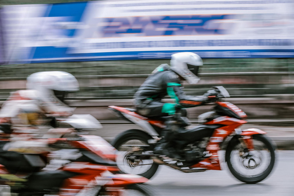 Khán giả cũng có cơ hôi trực tiếp giao lưu với các tay đua dày dặn kinh nghiệm thi đấu trong và ngoài nước của đội Honda Racing Vietnam là Cao Việt Nam, Lê Khánh Lộc và Nguyễn Vũ Thanh. (Ảnh: Minh Sơn/Vietnam+)