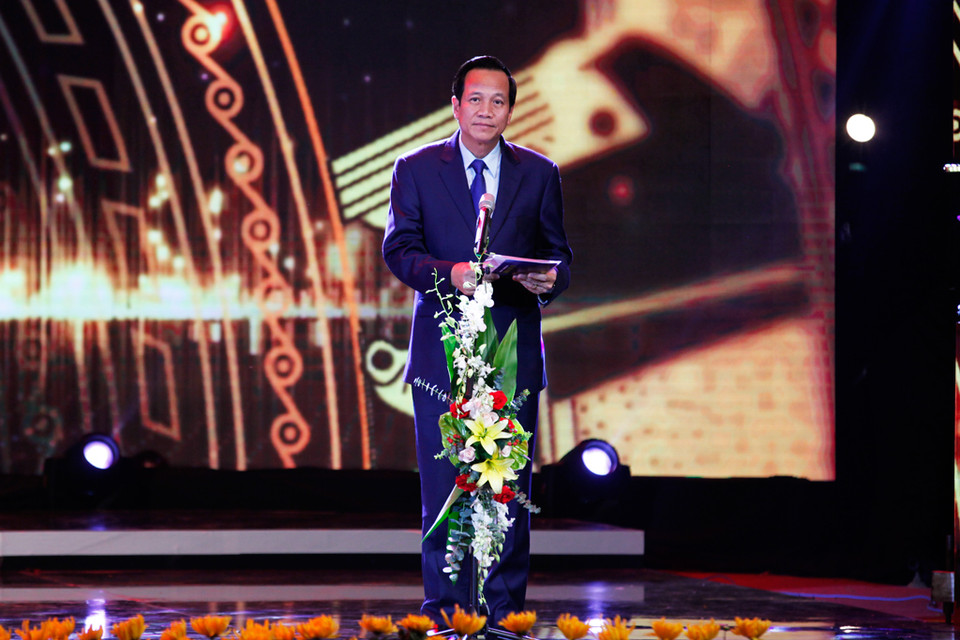 Ông Đào Ngọc Dung - Ủy viên Trung ương Đảng, Bộ trưởng Bộ Lao động - Thương binh và Xã hội công bố Giải Ba - Lĩnh vực Công nghệ thông tin. (Ảnh: PV/Vietnam+)