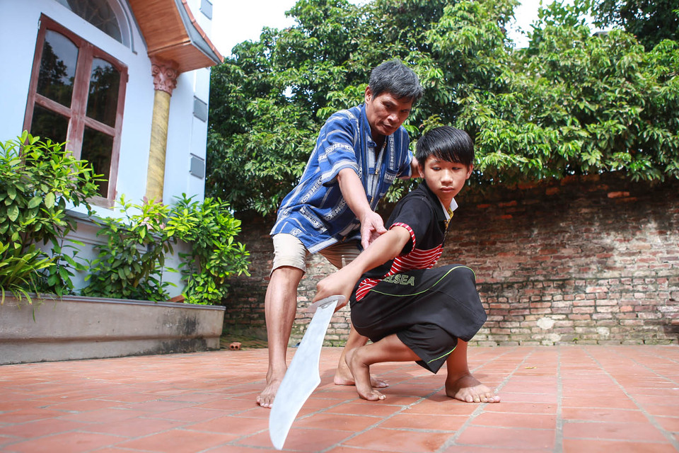 Lớp học võ miễn phí của ông Sơn được cả xã, huyện ủng hộ nhiệt tình vì vừa giúp mọi người rèn luyện sức khỏe lại có một sân chơi lành mạnh, bổ ích. (Ảnh: Minh Sơn/Vietnam+)